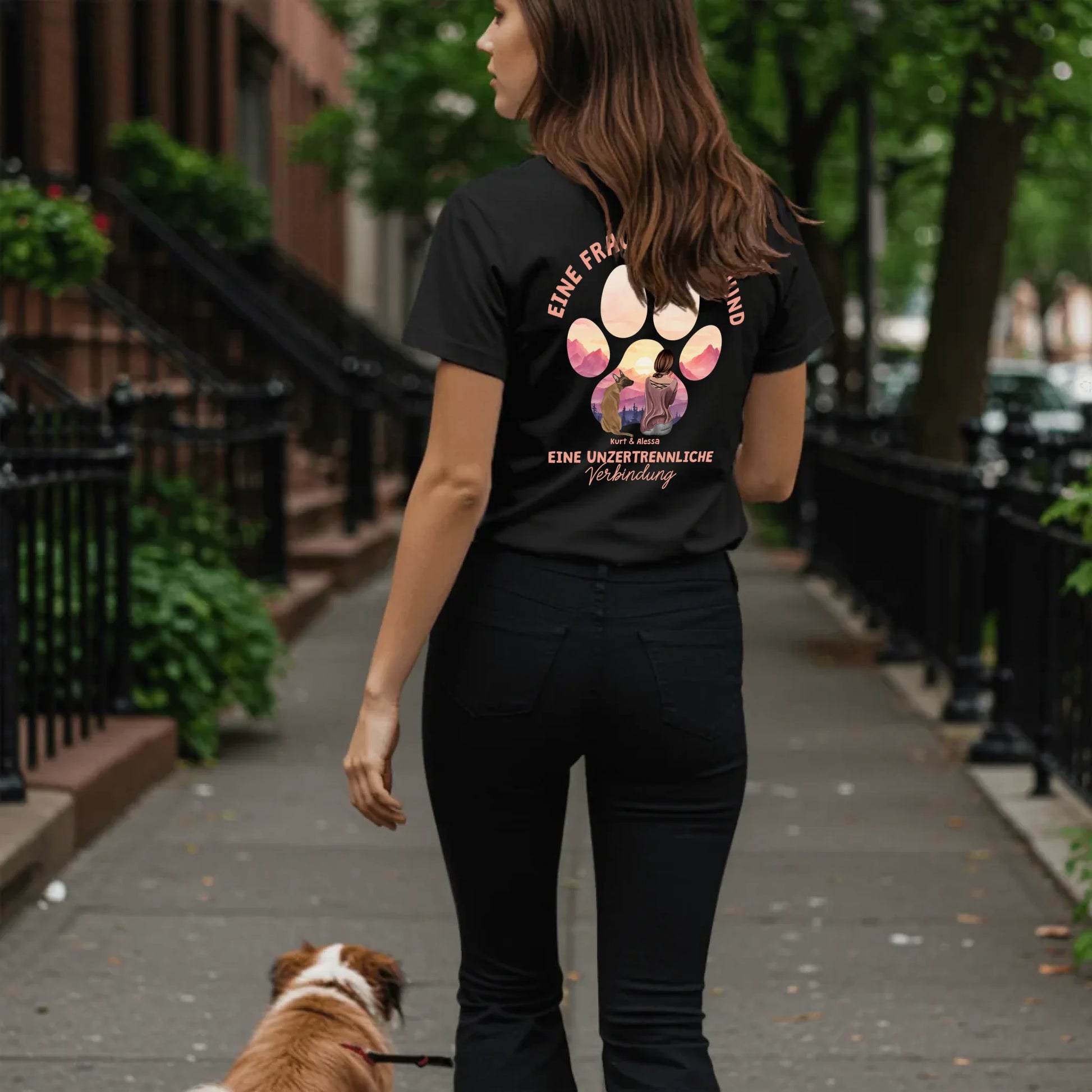 Woman walking dog on sidewalk - Black